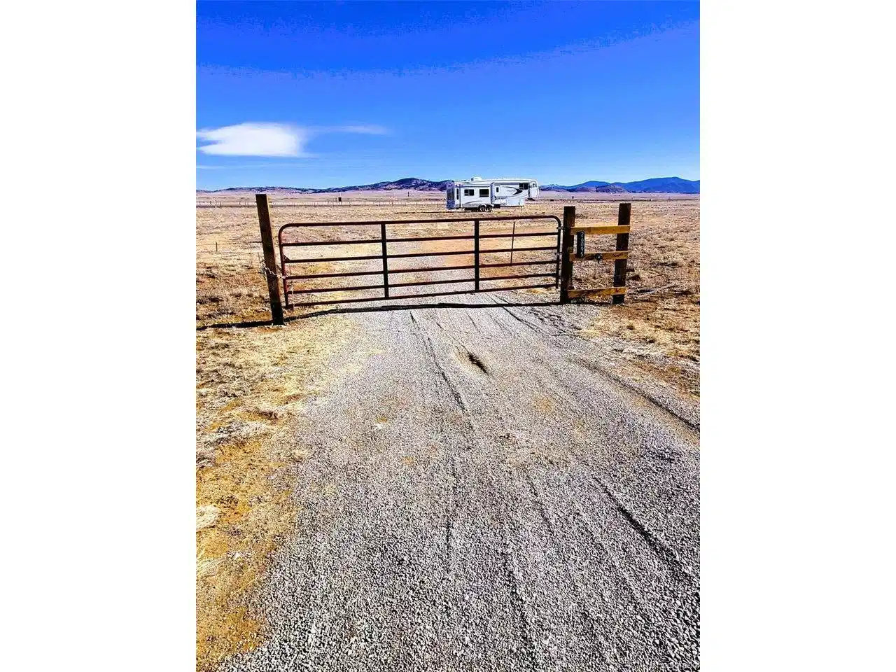 Image 1: Gated entrance into the property. Travel trailer is scheduled to be removed by 5/31/2026. Image 1: Gated entrance into the property. Travel trailer is scheduled to be removed by 5/31/2026.