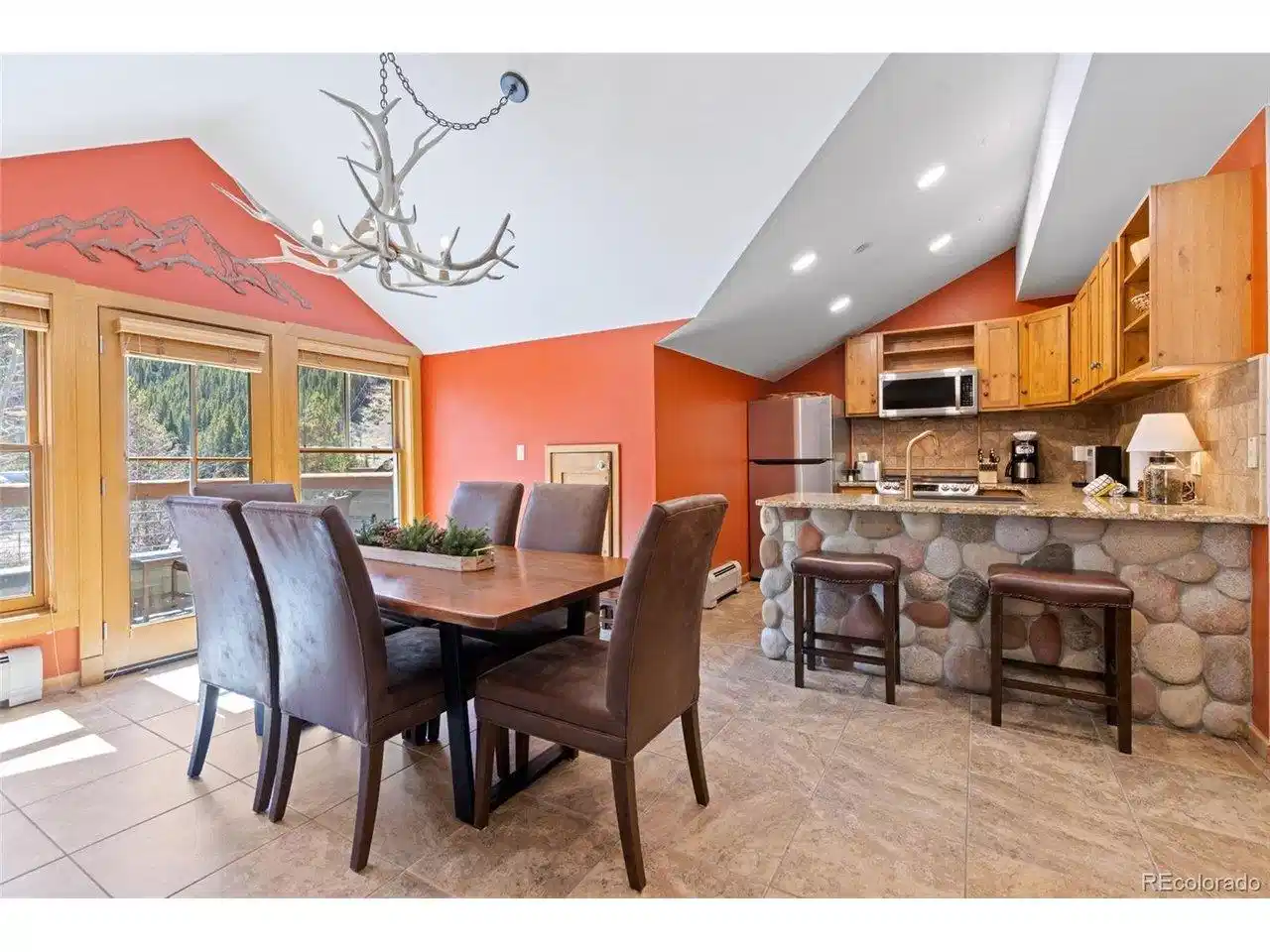 Image 1: Open kitchen, dinning and living area!