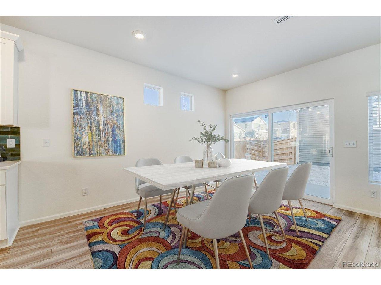 Image 4: Dining Room with sliding glass door to the patio