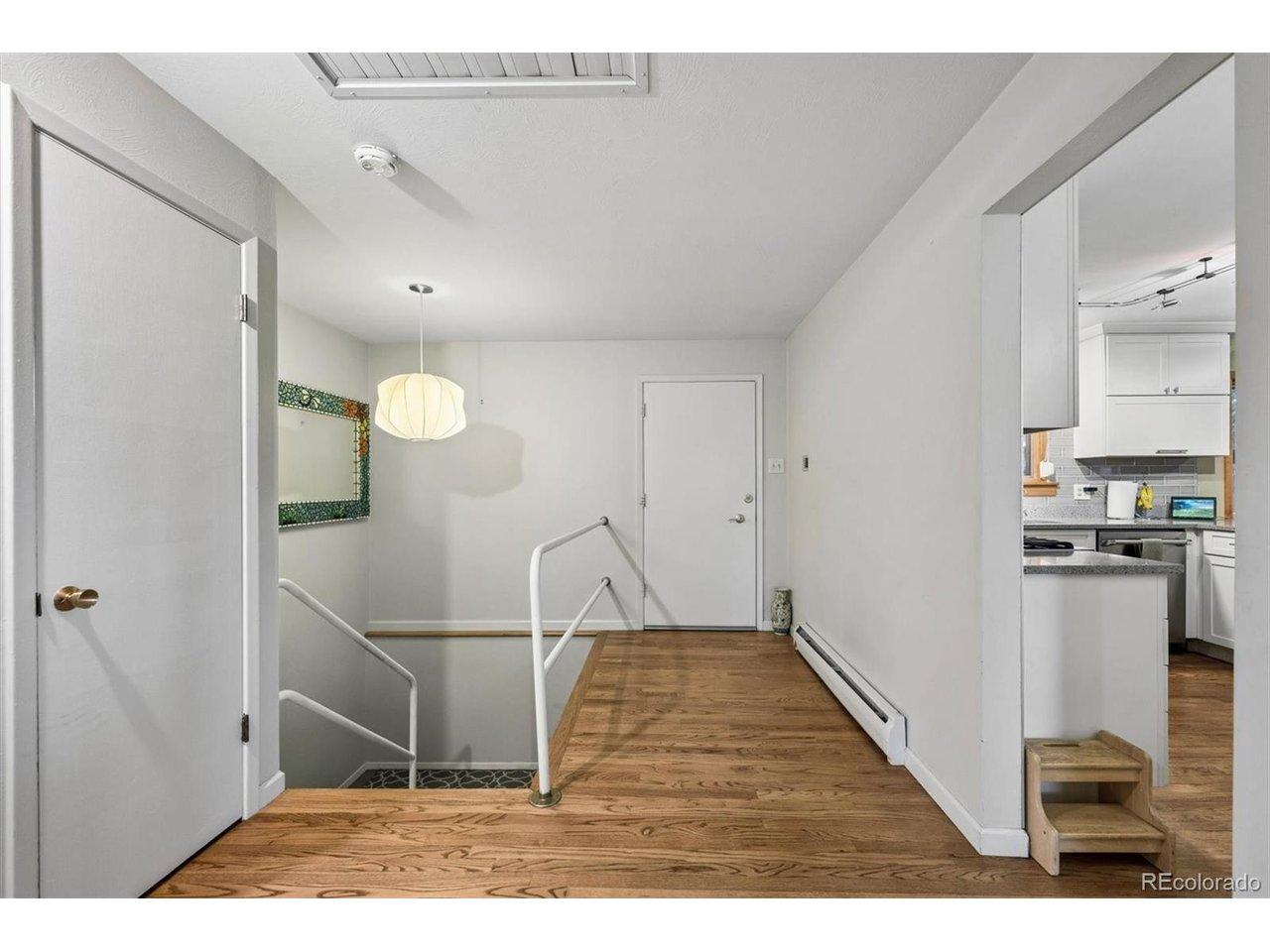Image 4: Foyer opens to the living room and kitchen. The foyer includes a coat closet for easy storage. Image 4: Foyer opens to the living room and kitchen. The foyer includes a coat closet for easy storage.