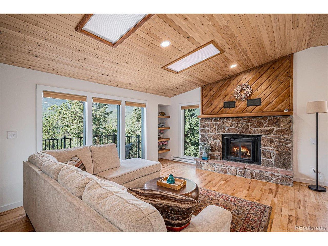 Image 4: Living room w new cedar plank ceiling Image 4: Living room w new cedar plank ceiling