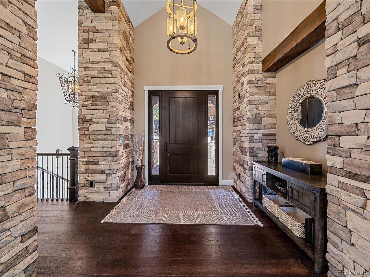 Image 4: Foyer and front door.