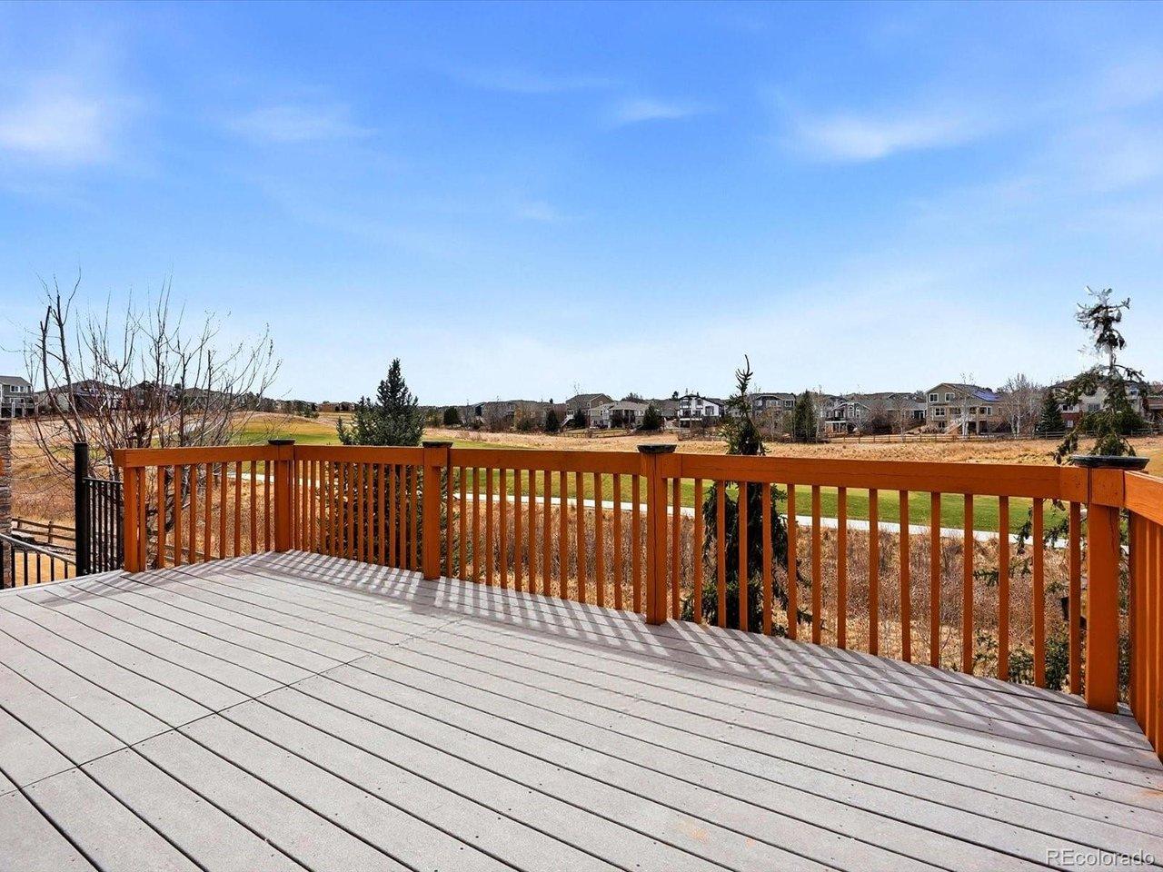 Image 3: Step outside to your spacious deck with incredible views!