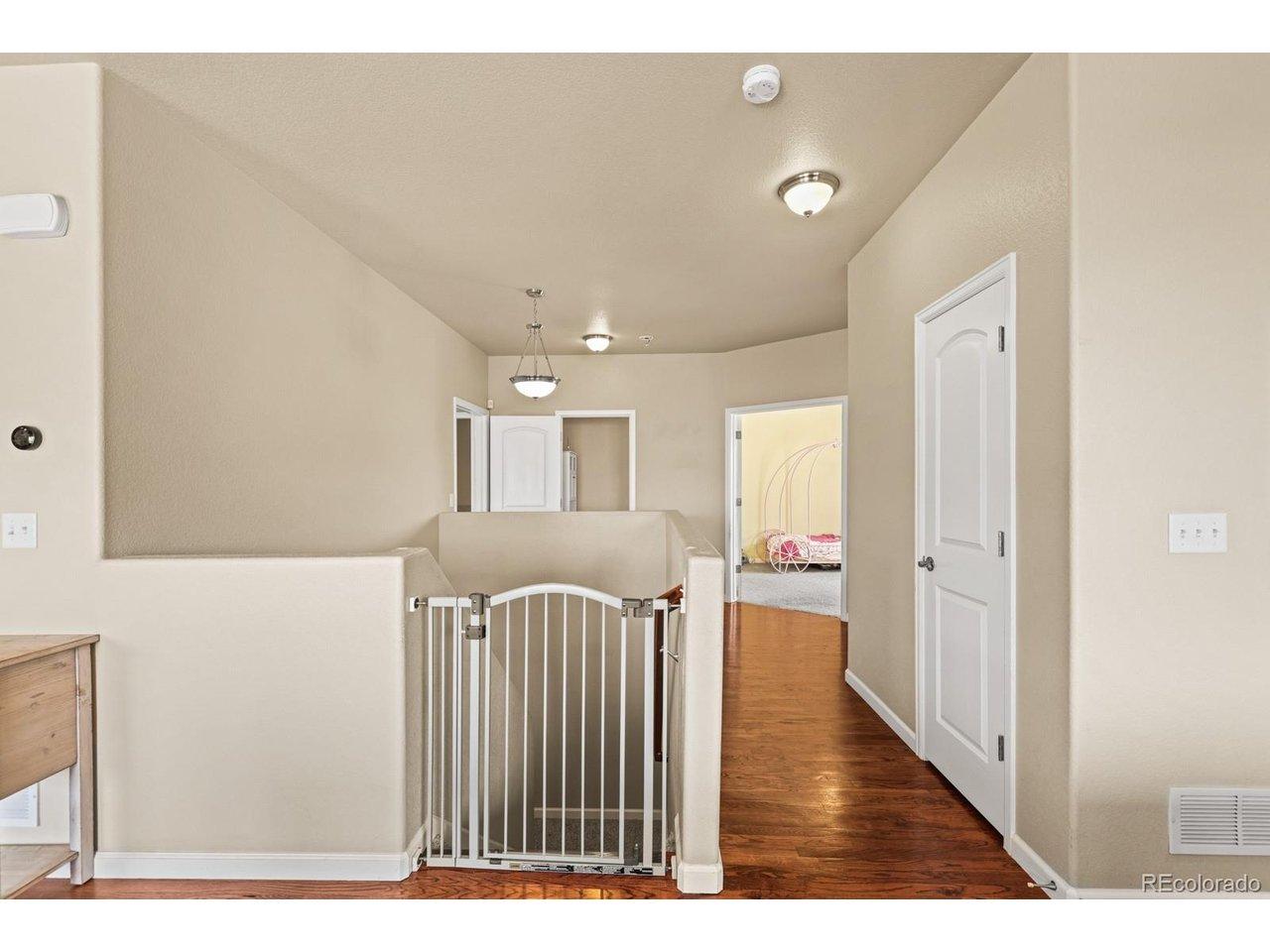 Image 4: Harwood floors in the hallway. Image 4: Harwood floors in the hallway.