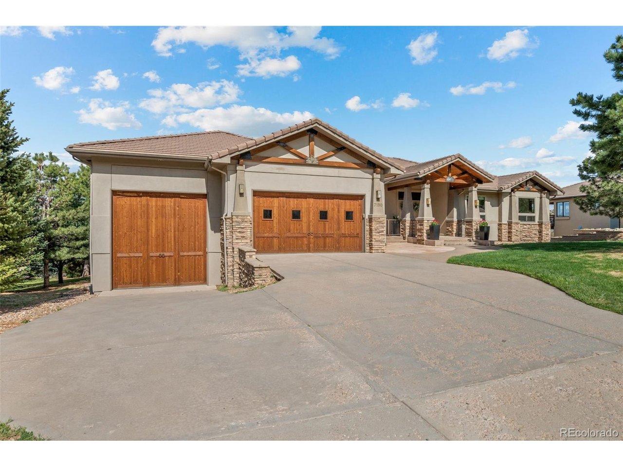 Image 2: A welcoming first impression - oversized driveway, classic Colorado architecture, and mature landscaping set the tone Image 2: A welcoming first impression - oversized driveway, classic Colorado architecture, and mature landscaping set the tone