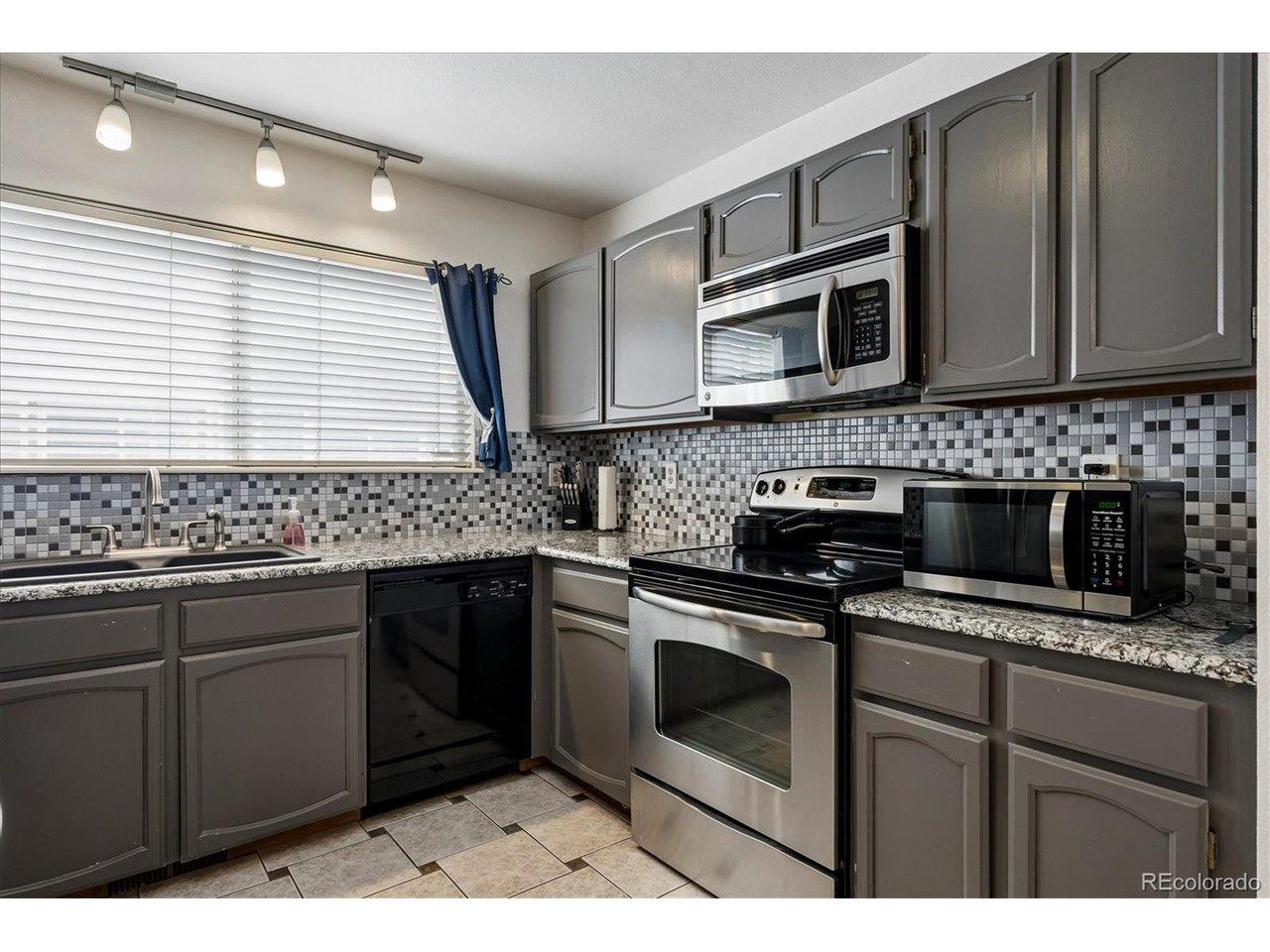 Image 4: Updated kitchen with granite countertops Image 4: Updated kitchen with granite countertops
