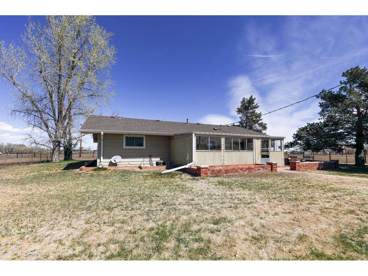 Image 4: Rear Elevation and coverer patio.