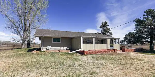 Image 4: Rear Elevation and coverer patio. Image 4: Rear Elevation and coverer patio.