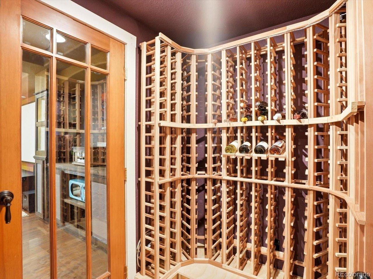 Image 3: Wine Cellar includes lighting, door lock, two separate doors and racks