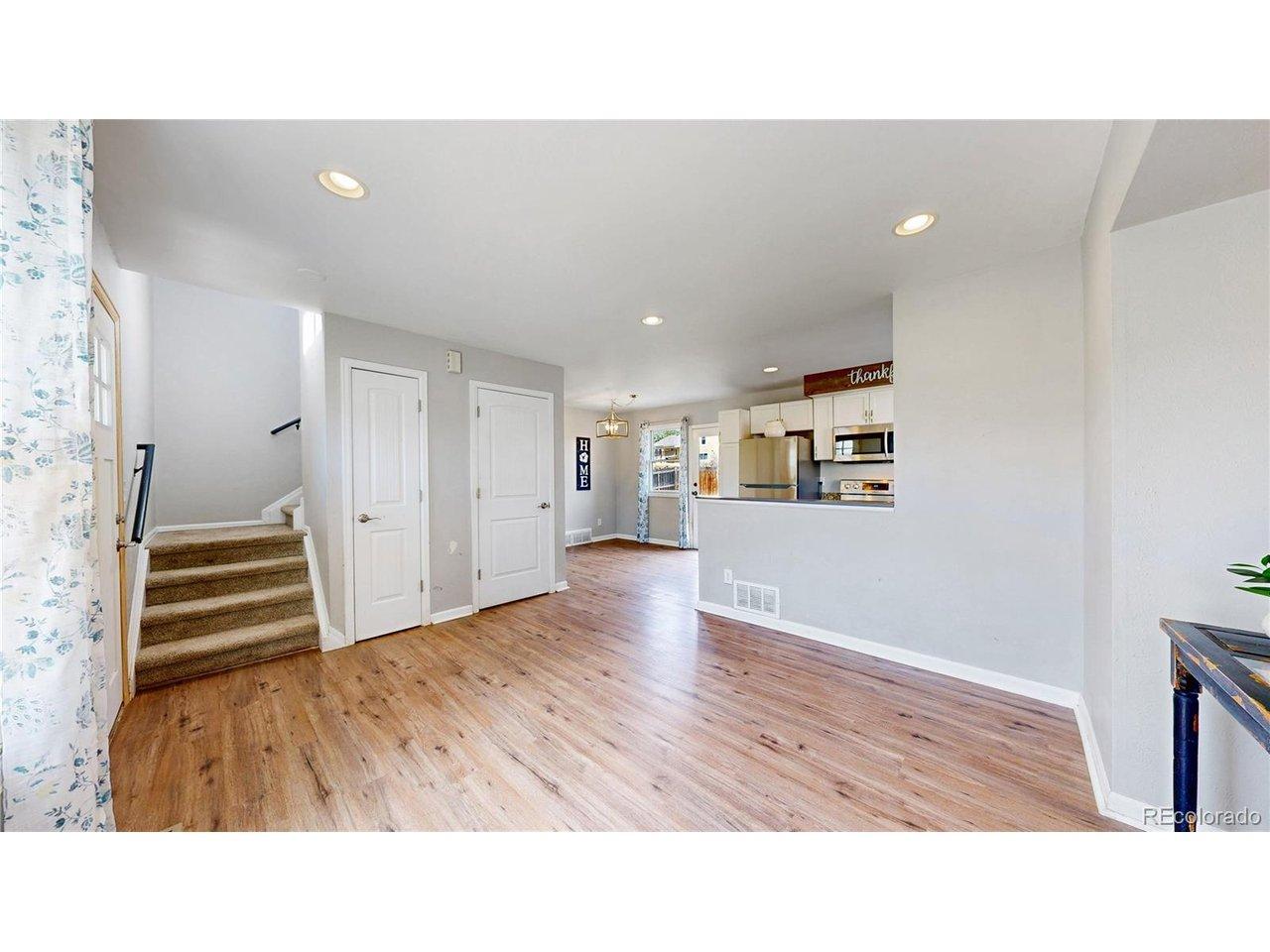 Image 4: Open to the kitchen and dining space. Image 4: Open to the kitchen and dining space.