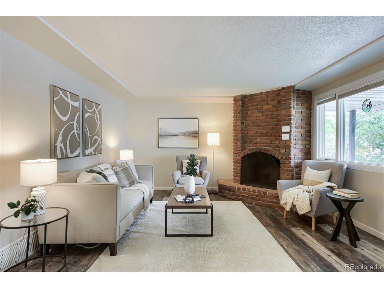 Image 2: Cozy living room with brick fireplace Image 2: Cozy living room with brick fireplace