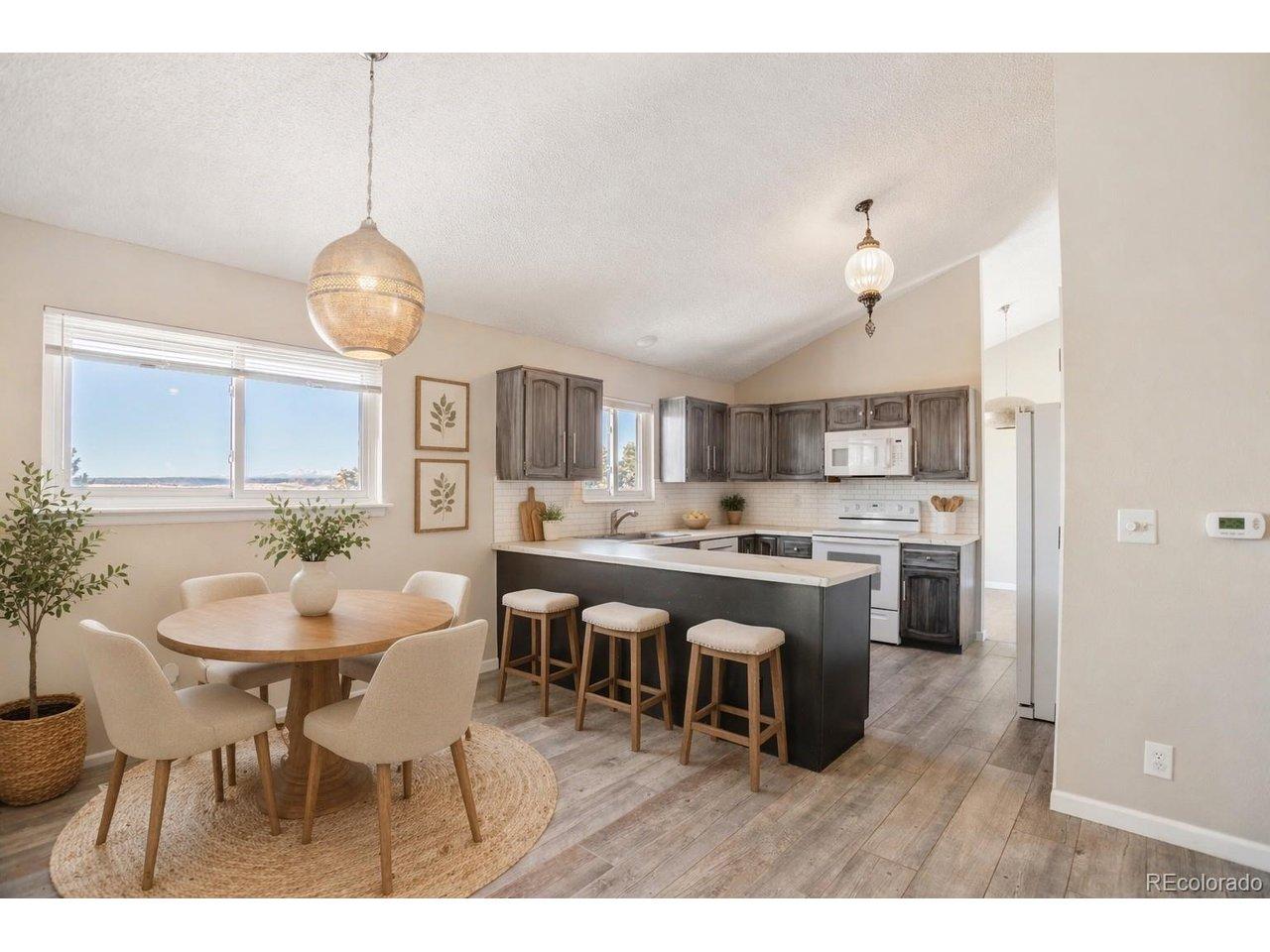 Image 1: Virtually Staged Kitchen and Breakfast Nook Image 1: Virtually Staged Kitchen and Breakfast Nook
