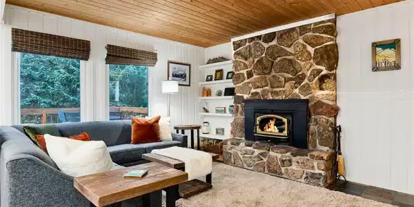 Image 3: Gather by the local granite fieldstone wood-burning fireplace after a long day on the slopes. Image 3: Gather by the local granite fieldstone wood-burning fireplace after a long day on the slopes.