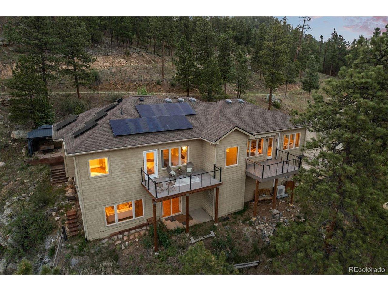Image 2: East Facing Custom Contemporary Balcony/Decks overlooking Bear Creek Canyon great places to hear the sounds of the Creek.Seller owned Solar supplies electricity throughout the year.. Image 2: East Facing Custom Contemporary Balcony/Decks overlooking Bear Creek Canyon great places to hear the sounds of the Creek.Seller owned Solar supplies electricity throughout the year..