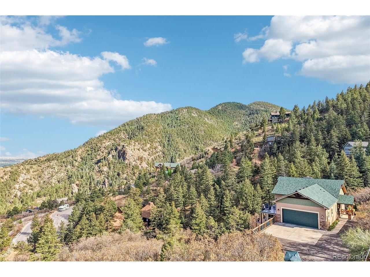 Image 1: View of this home nestled into the mountain with 360 degree views! Image 1: View of this home nestled into the mountain with 360 degree views!
