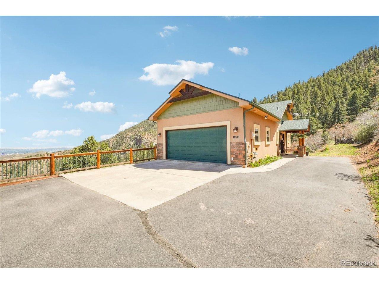 Image 2: Front of home surrounded by 360 degree views of mountains and Colorado Springs Image 2: Front of home surrounded by 360 degree views of mountains and Colorado Springs