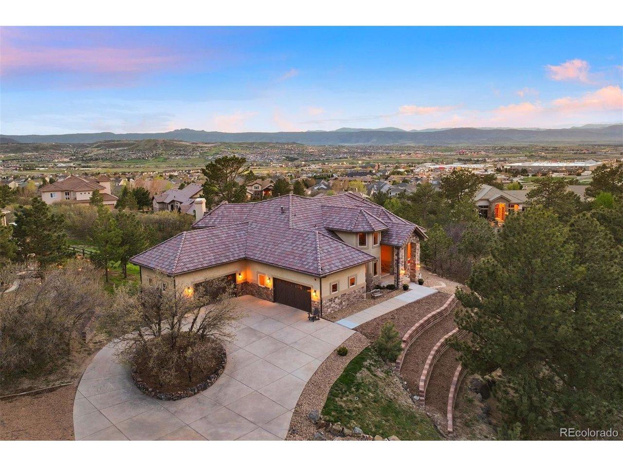 Image 2: Elevated above the surrounding rooftops, the home captures Front Range views while remaining quietly tucked into its setting. Image 2: Elevated above the surrounding rooftops, the home captures Front Range views while remaining quietly tucked into its setting.