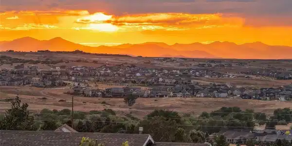 Image 3: Dramatic western skies and expansive mountain views define the elevated setting of this 2.5-acre property. Image 3: Dramatic western skies and expansive mountain views define the elevated setting of this 2.5-acre property.