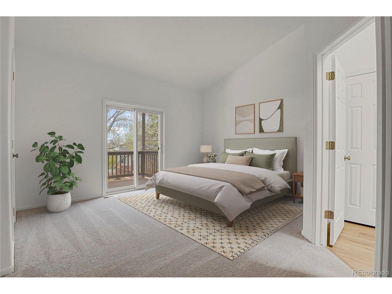 Image 2: Primary bedroom with a deck and view of lookout mountain Image 2: Primary bedroom with a deck and view of lookout mountain