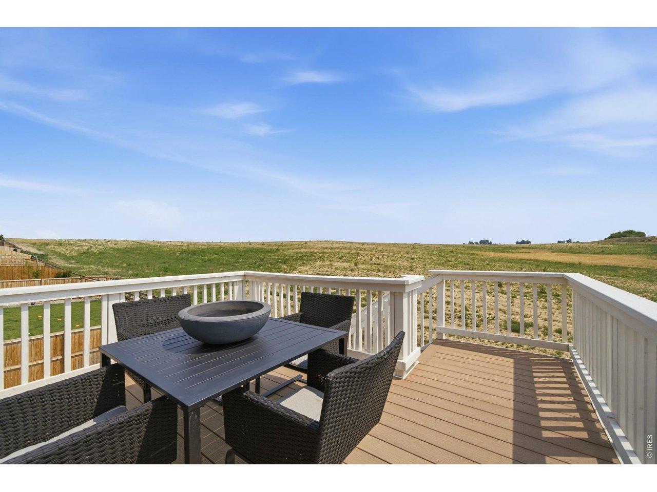 Image 1: Top Deck Which looks over Open Space, Full Mountain Views. Land behind home is privately owned with no intention of developing it in the near future. Image 1: Top Deck Which looks over Open Space, Full Mountain Views. Land behind home is privately owned with no intention of developing it in the near future.