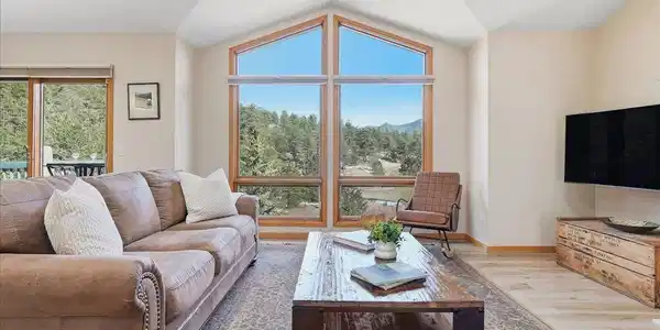 Image 2: Expansive windows showcase peaceful views Image 2: Expansive windows showcase peaceful views