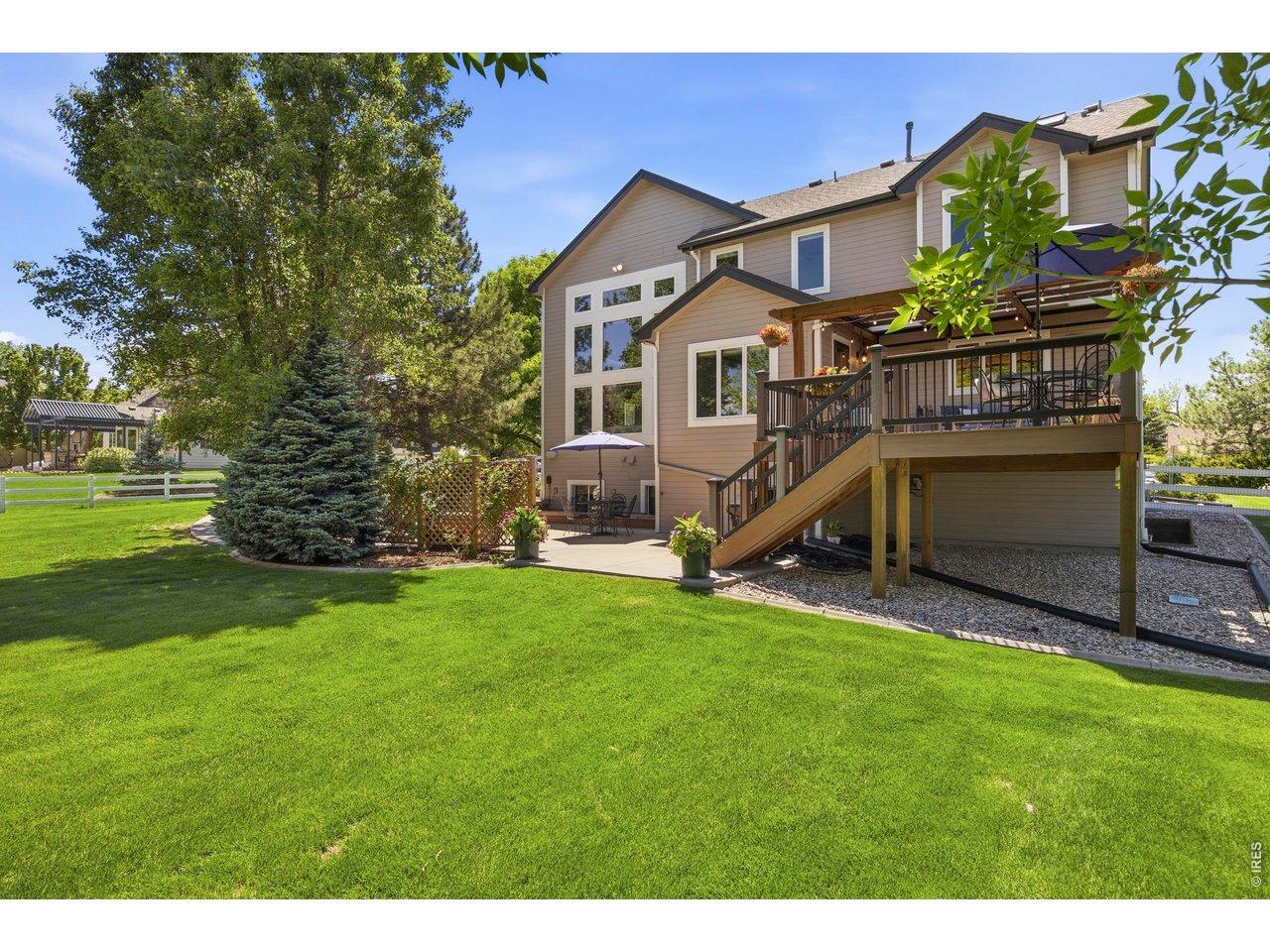 Image 3: Huge Entertainer's Backyard with Deck, Extended Patio & Mature Trees Image 3: Huge Entertainer's Backyard with Deck, Extended Patio & Mature Trees