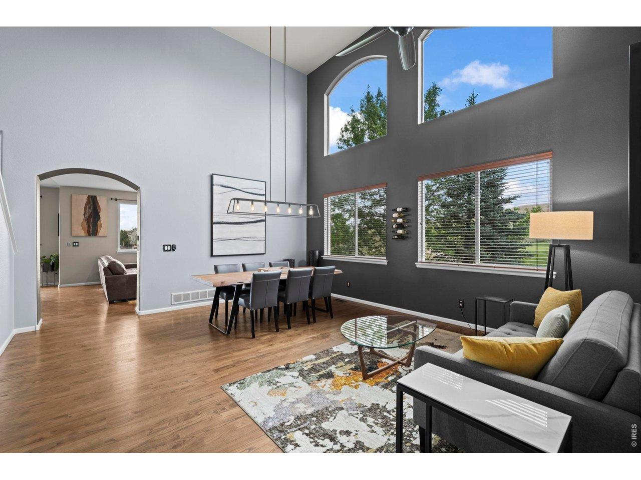 Image 2: Light and bright at entry with two story ceilings