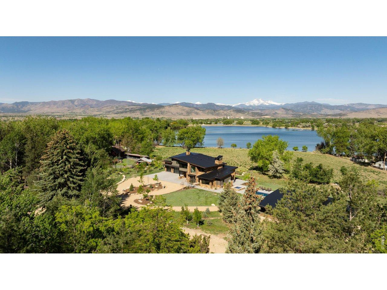 Image 1: Looking West over the property at Burch Lake and Longs Peak