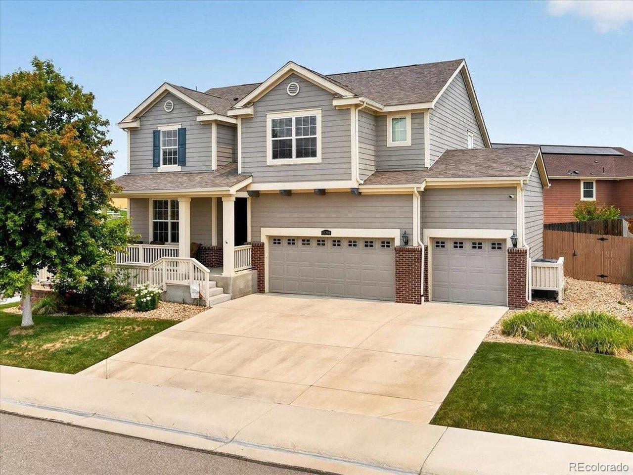Image 2: Exceptional curb appeal welcomes you home with a charming covered front porch, attractive Craftsman-inspired architecture, mature landscaping, and a spacious three-car garage. Image 2: Exceptional curb appeal welcomes you home with a charming covered front porch, attractive Craftsman-inspired architecture, mature landscaping, and a spacious three-car garage.