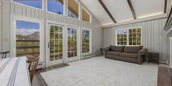 Image 4: main level living room with vaulted ceiling, new carpet throughout Image 4: main level living room with vaulted ceiling, new carpet throughout