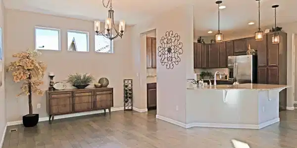 Image 3: As you enter, HIGH celinings, open floor plan, granite, SS appliances, breakfast bar!