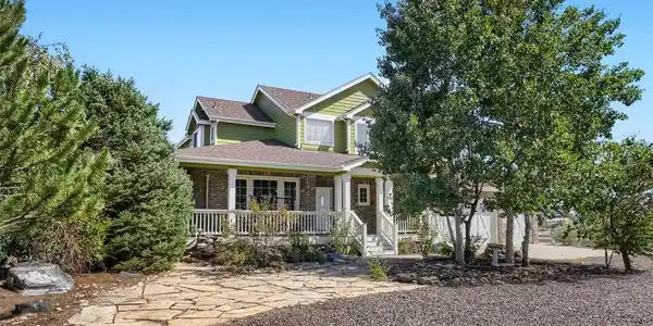 Image 2: This home features professional xeriscaped landscaping. Image 2: This home features professional xeriscaped landscaping.