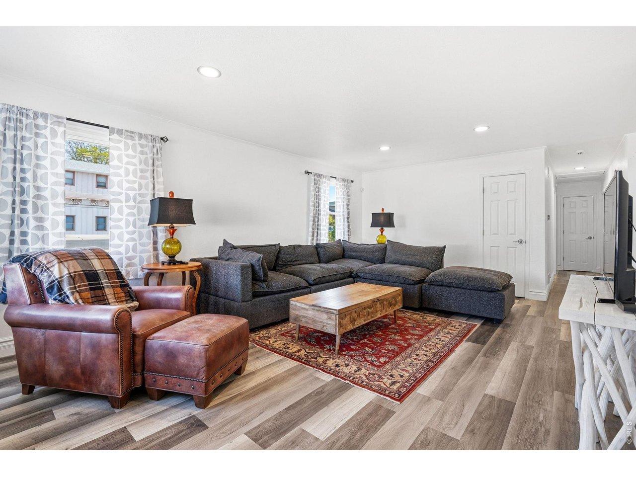 Image 4: Bright and inviting living room with a bay window Image 4: Bright and inviting living room with a bay window