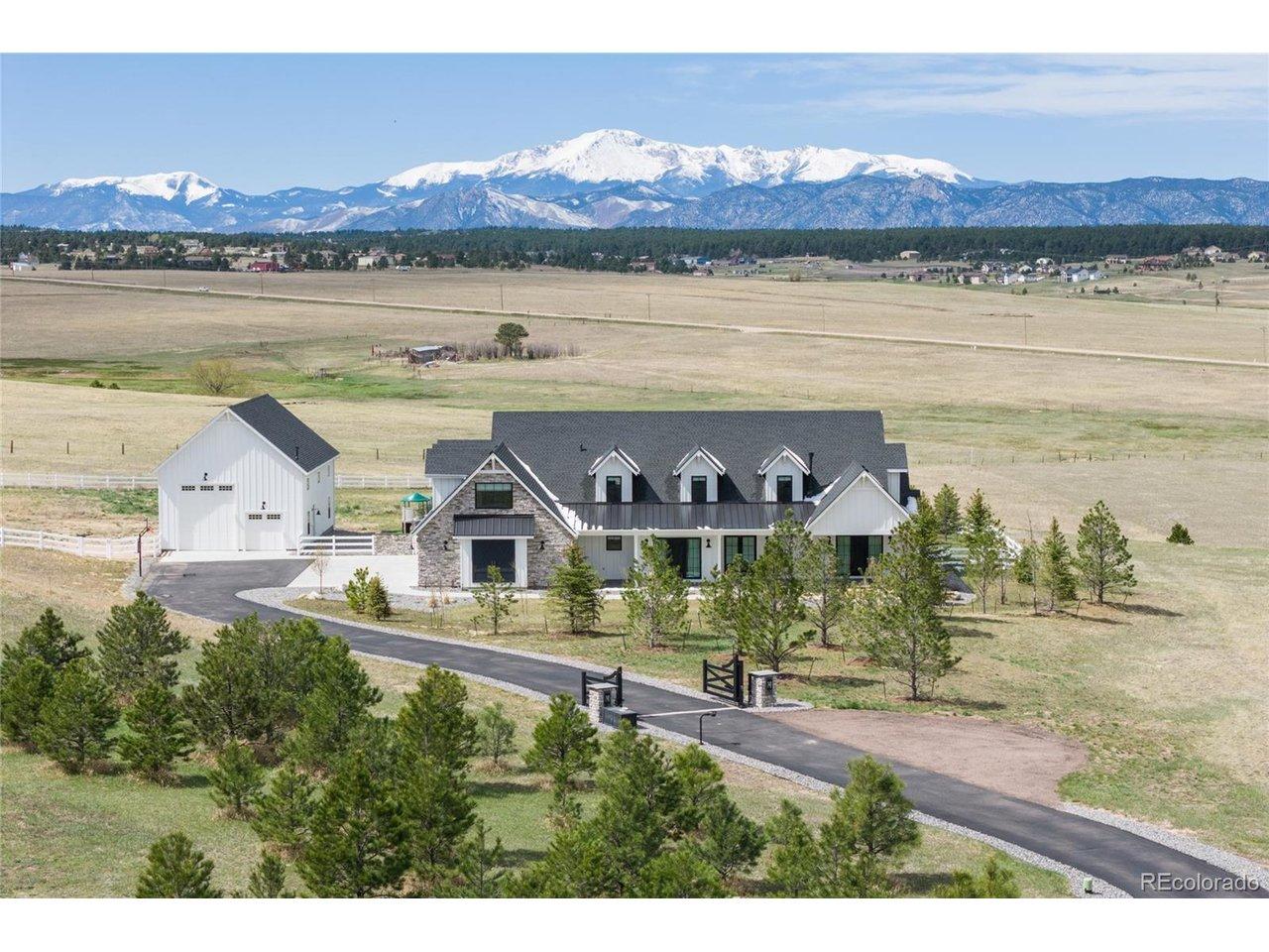 Image 1: Breathtaking views welcome you home to this stunning property.