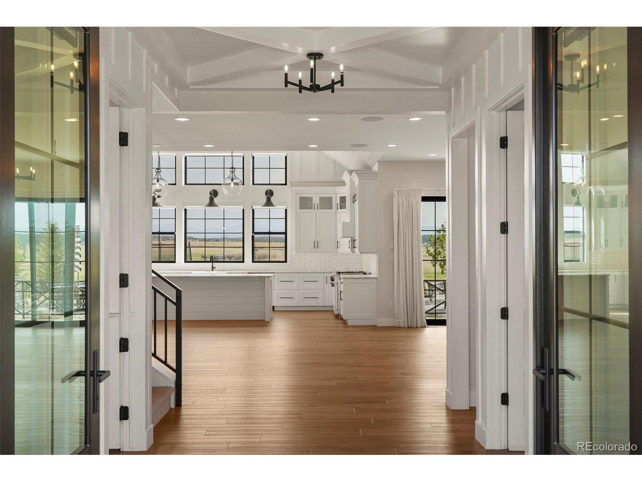 Image 4: Beautiful double doors frame your entry.