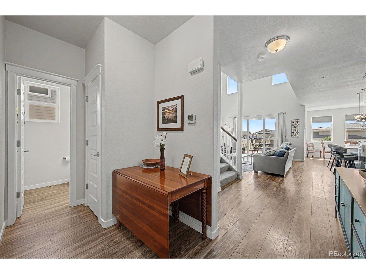 Image 3: Step into the foyer and marvel at the view of the open living area bathed in natural light. Image 3: Step into the foyer and marvel at the view of the open living area bathed in natural light.