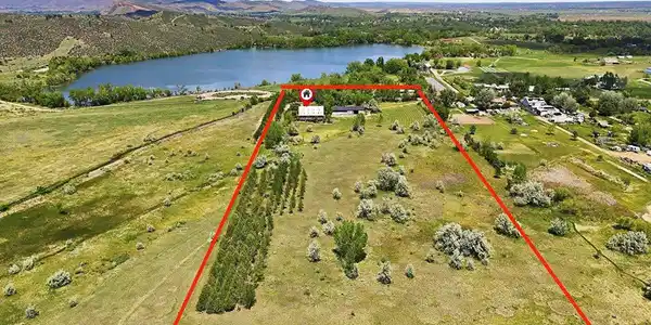 Image 2: Located on over 14 acres near Claymore Lake, this property provides room to roam, relax, and enjoy the quiet beauty of its natural surroundings. Image 2: Located on over 14 acres near Claymore Lake, this property provides room to roam, relax, and enjoy the quiet beauty of its natural surroundings.