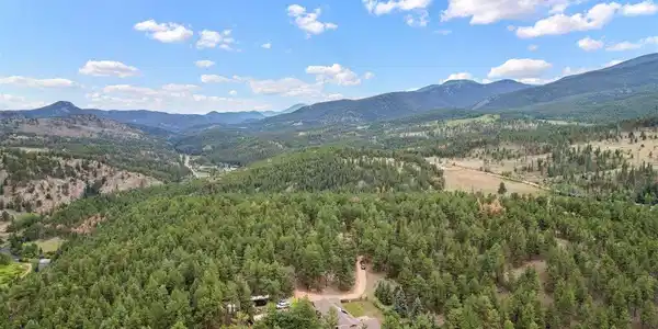Image 2: 54+ acres of secluded raised ranch-style property. Image 2: 54+ acres of secluded raised ranch-style property.
