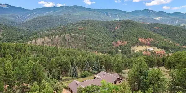Image 3: Top of the valley views of Payne Peak and the Pike National Forest. Image 3: Top of the valley views of Payne Peak and the Pike National Forest.