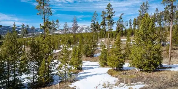 Image 2: Pole Creek Golf CourseImagine hosting family and friends in your custom-built sanctuary, surrounded by the beauty of the Rocky Mountains.