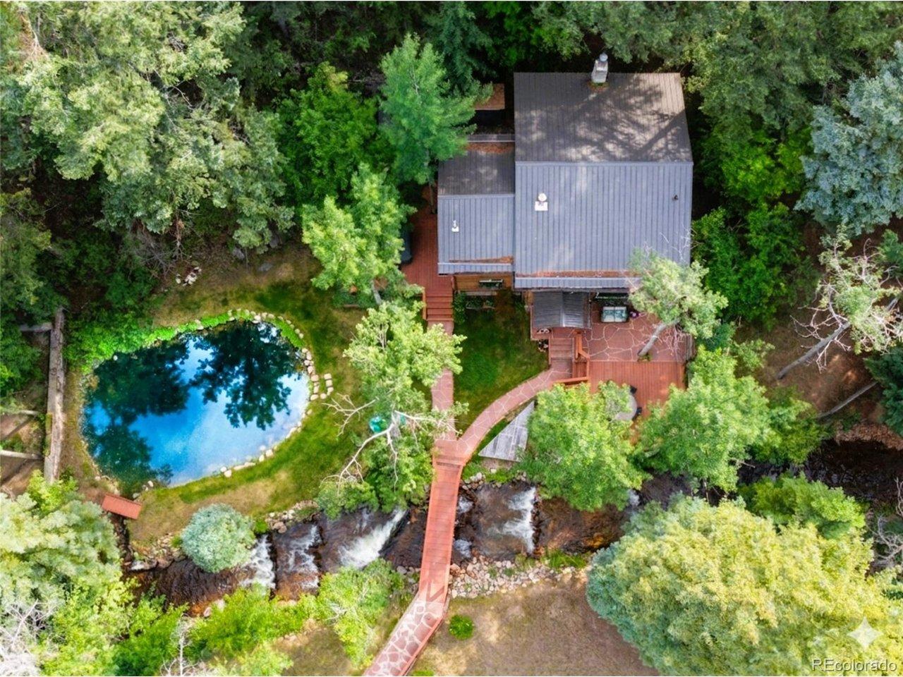 Image 2: Birds eye view with pond and creek Image 2: Birds eye view with pond and creek