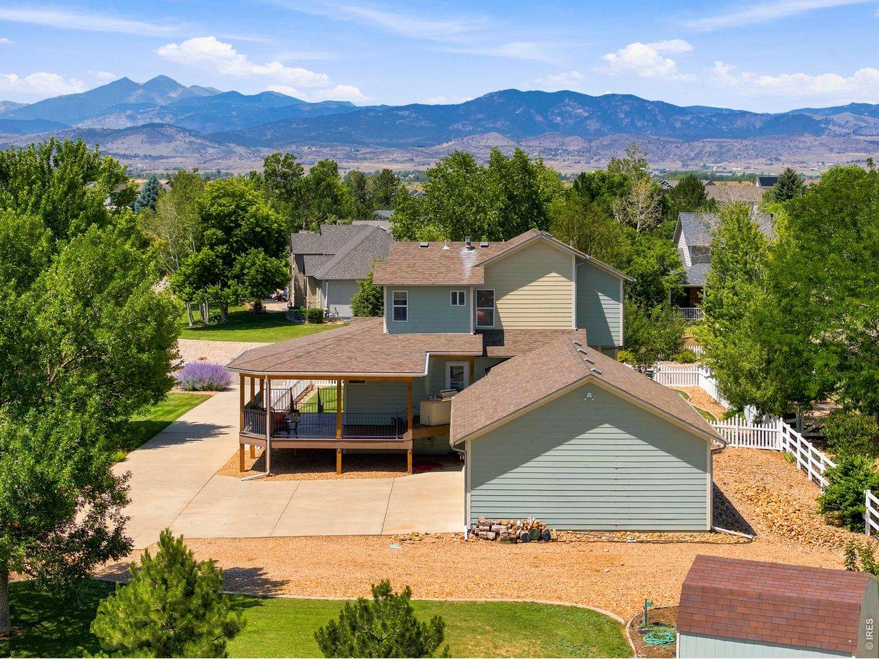 Image 3: Mountain-view curb appeal with expansive driveway, oversized garage, and wraparound porch for relaxing outdoors. Image 3: Mountain-view curb appeal with expansive driveway, oversized garage, and wraparound porch for relaxing outdoors.