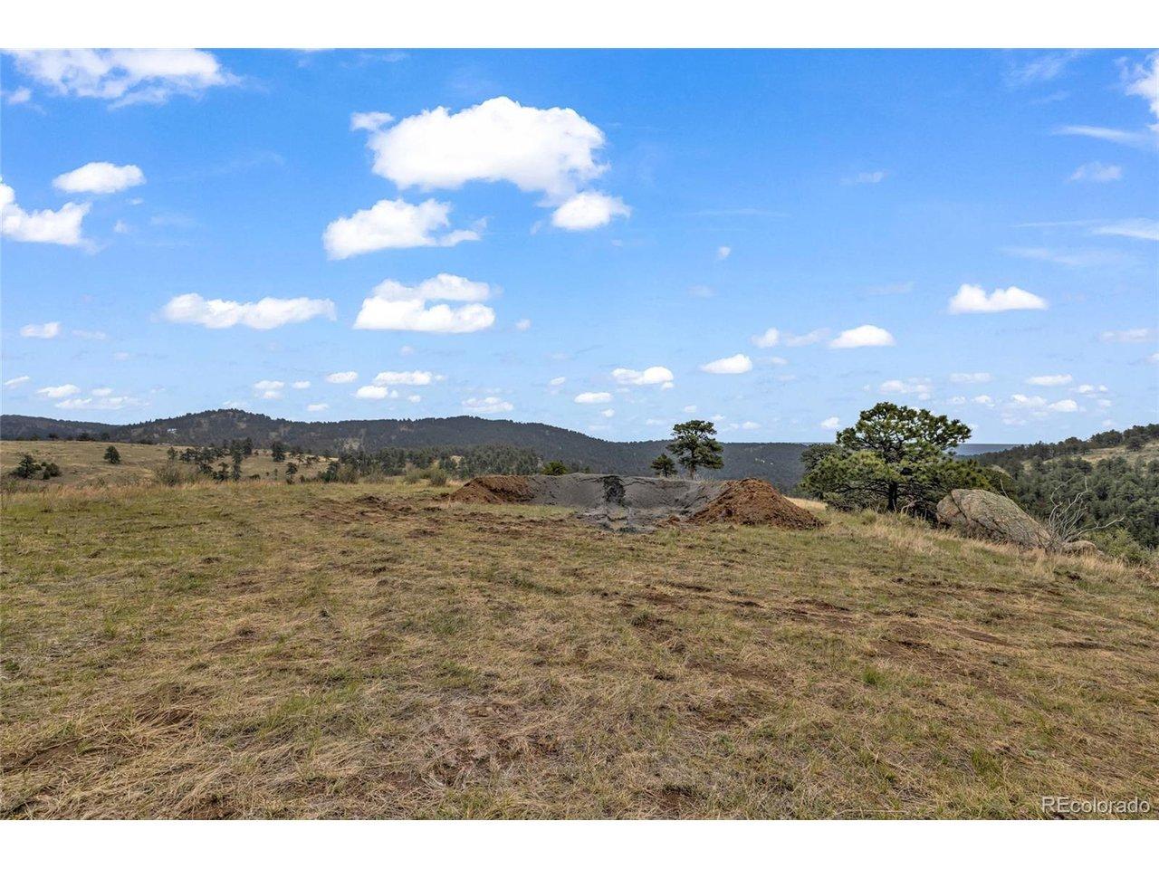 Image 4: well drilling tailings shown looking towards east on level homesite Image 4: well drilling tailings shown looking towards east on level homesite