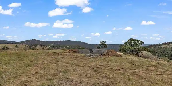 Image 4: well drilling tailings shown looking towards east on level homesite