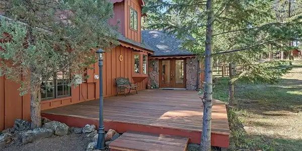 Image 2: A spacious redwood deck leads you to the entry.... Image 2: A spacious redwood deck leads you to the entry....