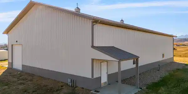Image 3: Pole barn with overhead door and concrete floors Image 3: Pole barn with overhead door and concrete floors