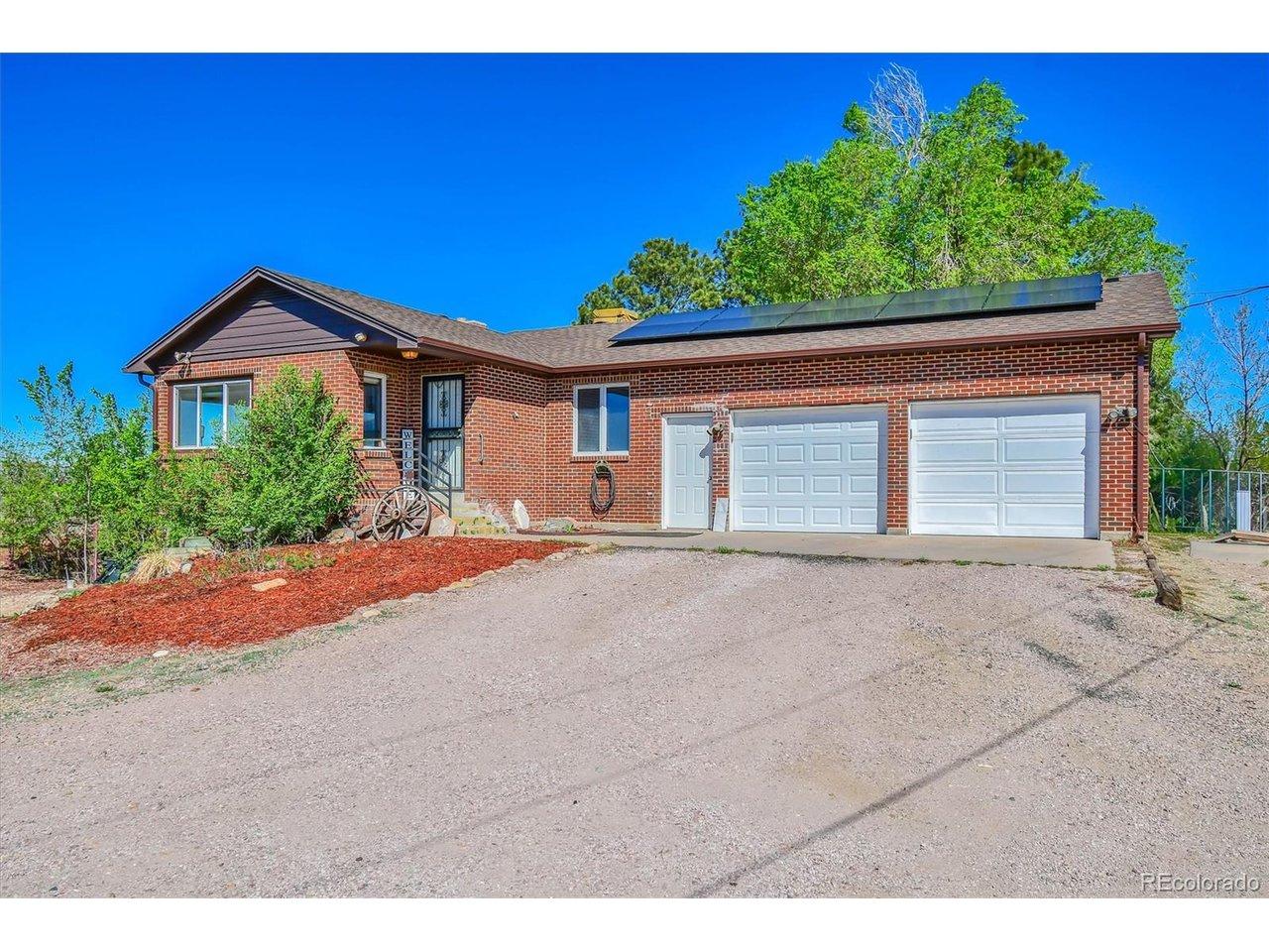 Image 1: Front of house with plenty of space for parking