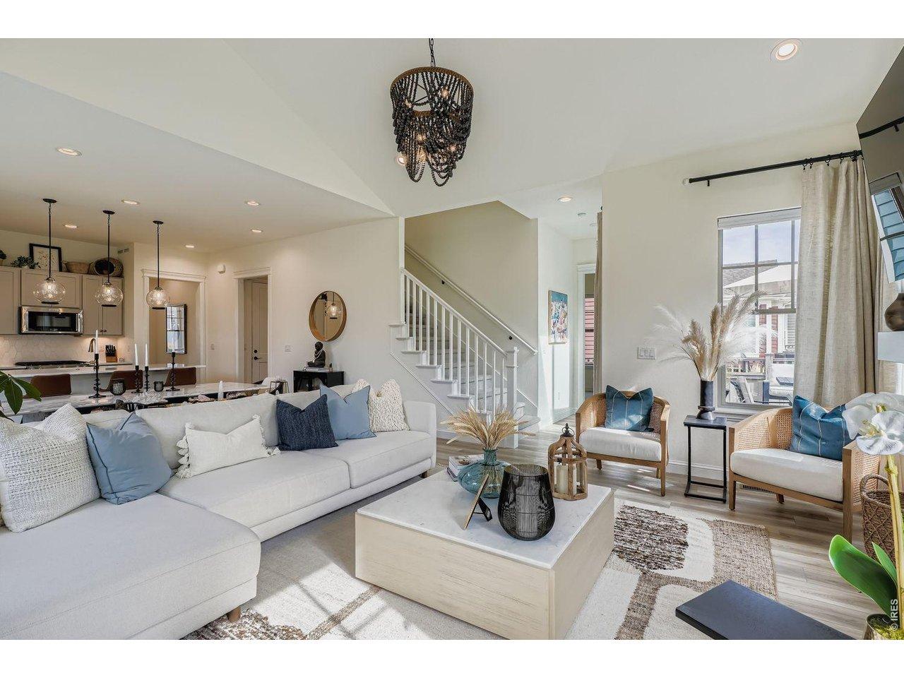 Image 3: Home is where you can gather and this open concept living allows for the whole family and mire.