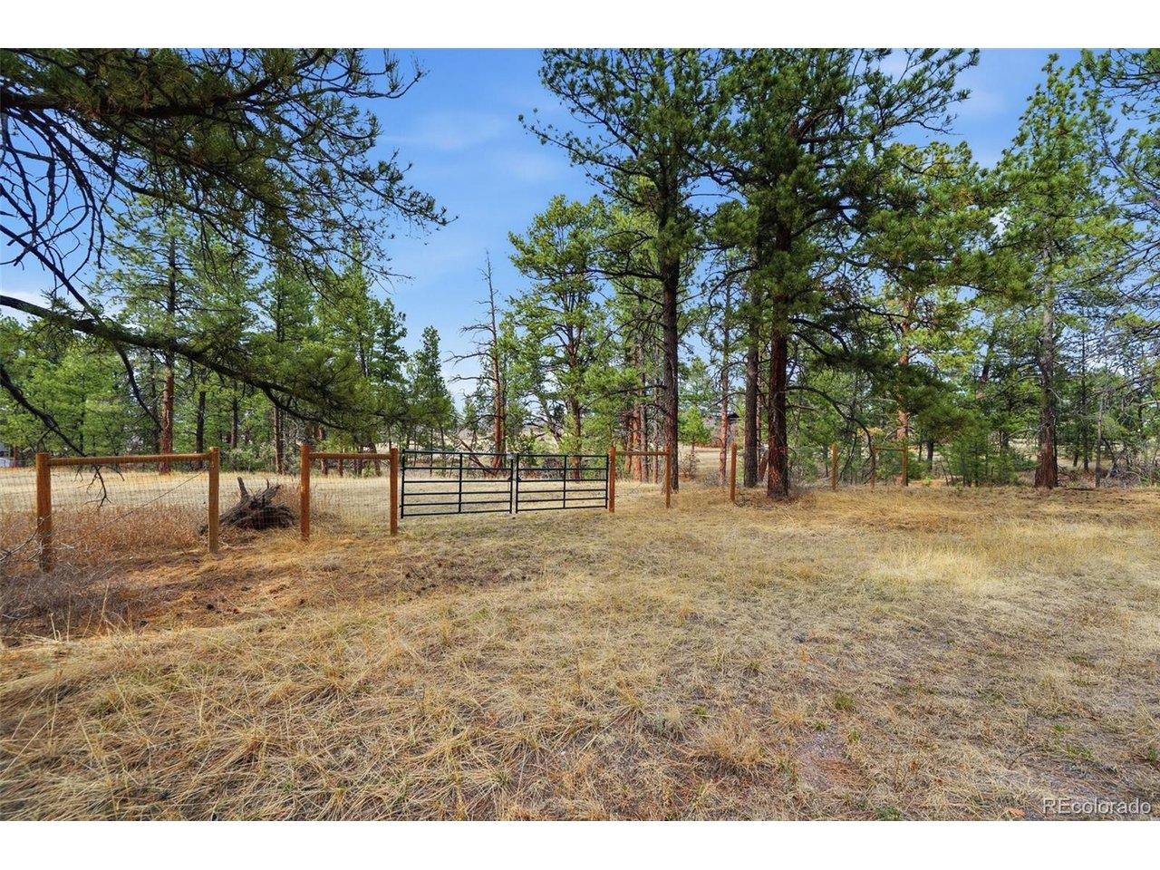 Image 1: Entry gate to the lot. Seen from E Park Dr Image 1: Entry gate to the lot. Seen from E Park Dr