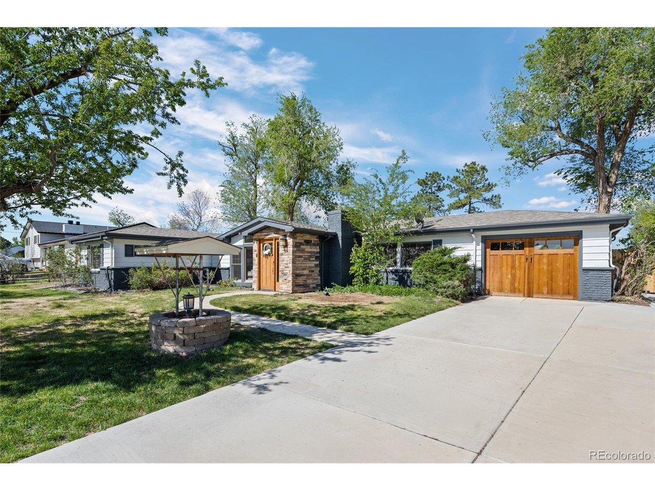 Image 2: Nice long driveway that continues down backside of house to detached garage Image 2: Nice long driveway that continues down backside of house to detached garage
